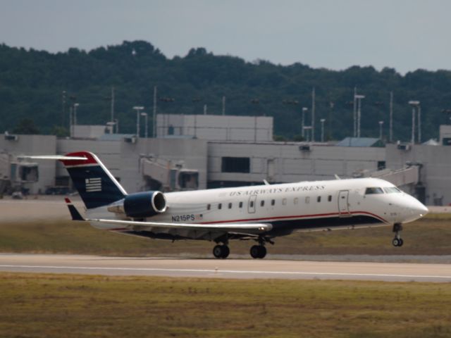 Canadair Regional Jet CRJ-200 (N215PS) - Just lifting off of 20R at BNA on 7/7/2013