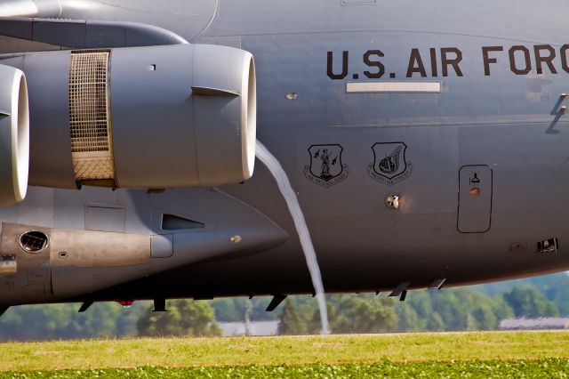 Boeing Globemaster III — - Vapor cone from engine during reverse thrust