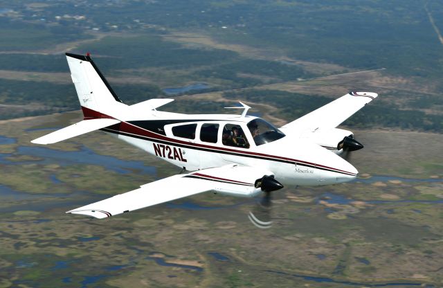 Beechcraft 55 Baron (N72AL) - Air-to-air photo flight from Slidell