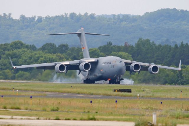 Boeing Globemaster III (05-5140) - A C-17 (05-5140, c/n P140) carrying fire apparatus touching down on a very short runway at Sparta/Fort McCoy Airport on 15 July 2013.