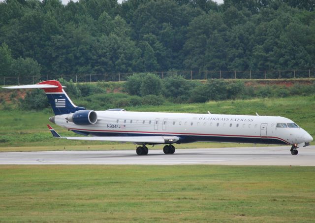 Canadair Regional Jet CRJ-900 (N934FJ) - In position 18C - 7/12/10