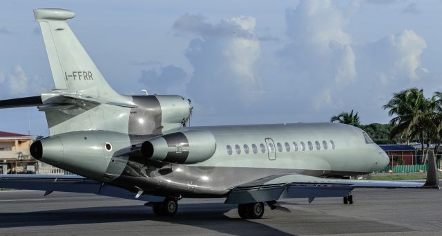 Dassault Falcon 7X (I-FFRR) - Falcon 7X Italian registered I-FFRR better known and RAPID RACER sporting the words ONLY THE BRAVE seen back tracking the active after landing at St Maarten.