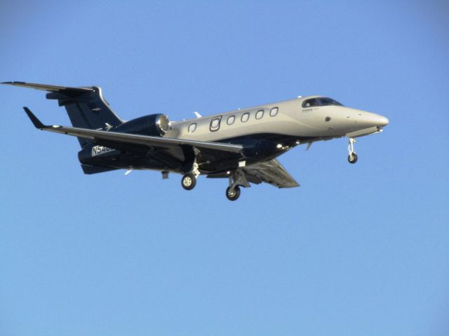 Embraer Phenom 300 (N548EG) - Landing RWY 20R