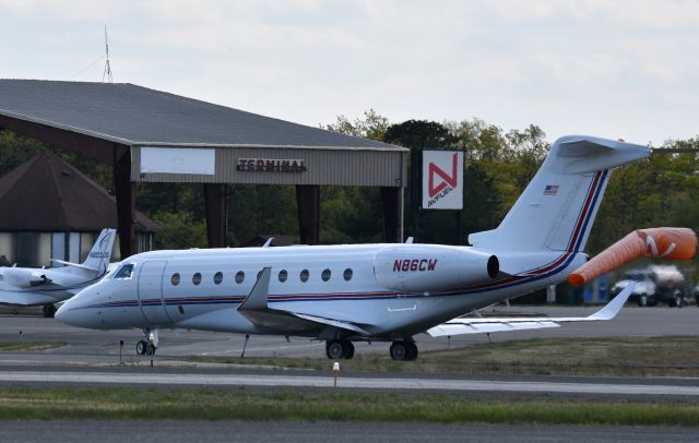 IAI Gulfstream G280 (N86CW) - The Costco Warehouse Corporate Jet taxis into the ramp area at Wall/Belmar NJ KBLM May, 2020