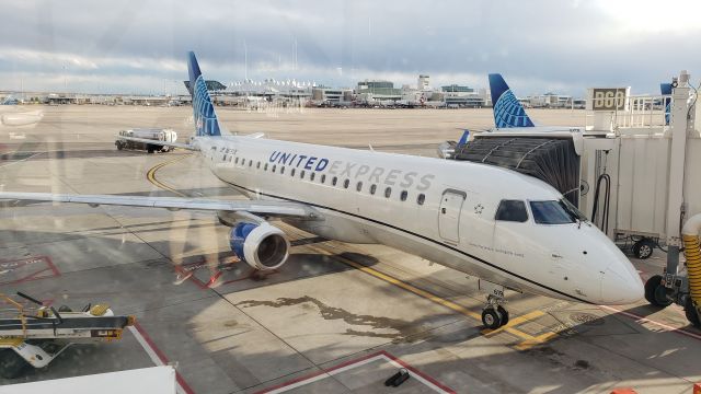 Embraer 175 (N619UX) - At gate B60 in Denver