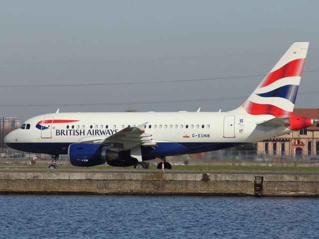 Airbus A318 (G-EUNB) - With a high tail and a stubby fuselage this aircraft just doesn't look right. A A318 seen here taxiing back to the terminal at London City Airport. Two A318's are used to fly the London City to New York City service