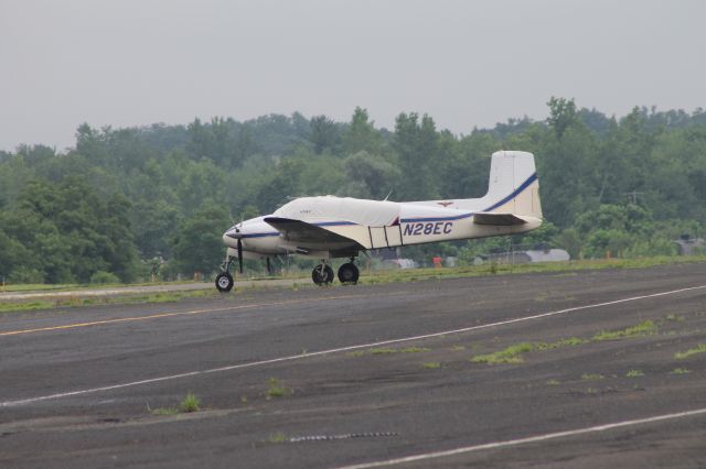 Beechcraft Twin Bonanza (N28EC) - Copyright 2013 GA Spotter Photography