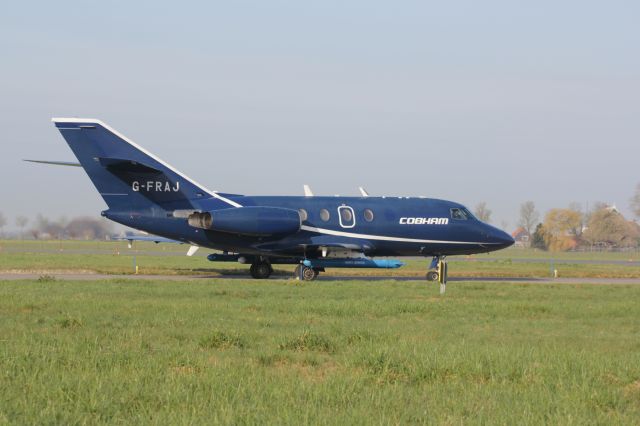 Dassault Falcon 20 (G-FRAJ) - spottersday april 5th EHLW on the field next to the south apron 05