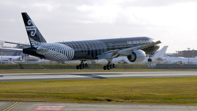 BOEING 777-300ER (ZK-OKQ) - BOE55 nears touchdown on runway 16R to complete a test flight on 1/5/12. (LN:984 cn 40689).