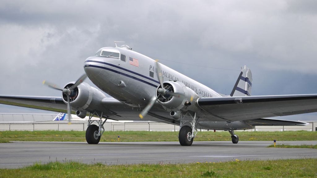 Douglas DC-3 (N877MG) - Historic Flight Foundations DC-3 (Ser#4193) taxis on Kilo-7 during their "Shakedown" on 4/20/13.