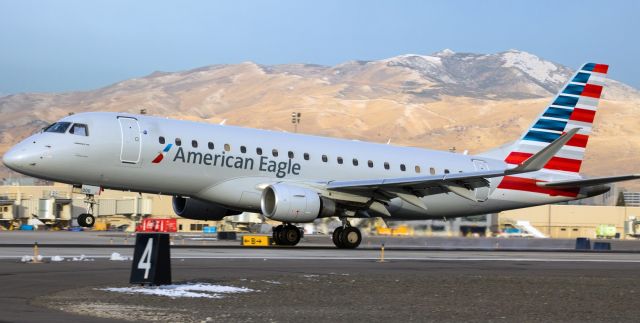 Embraer 175 (N206NN) - The mains are on the 16R concrete as N206NN arrives from LA.br /Clicking on FULL should provide a fine view of this snap.