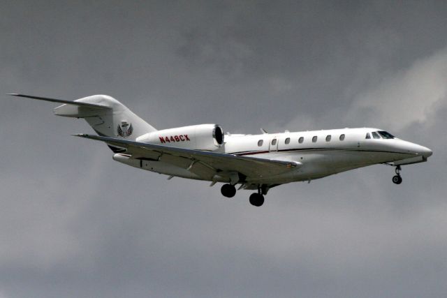 Cessna Citation X (N448CX) - On short finals for rwy 10L on 2-May-18.