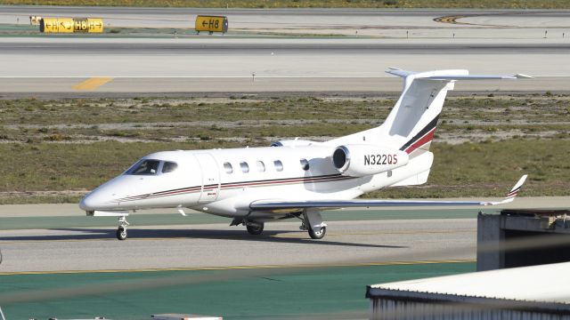 Embraer Phenom 300 (N322QS) - Taxiing for departure