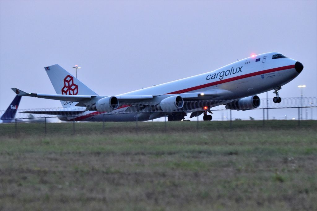 Boeing 747-400 (LX-NCL) - Departing 23-L on 09-12-21 at dawn, about six minutes prior to official sunrise