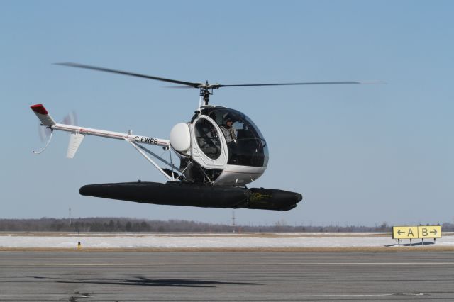 SCHWEIZER 269 (C-FWPB) - Departing from service - Schweizer 269C - about to depart Kingston, Ontario