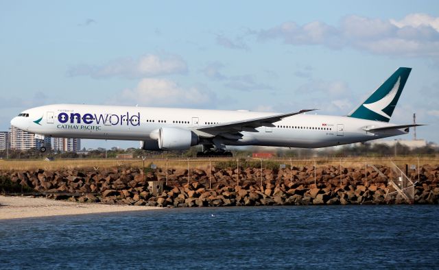 BOEING 777-300ER (B-KQL) - Lifting Off from Rwy 34L