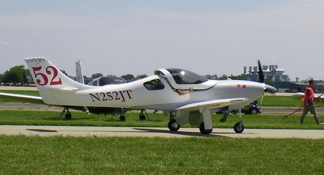 Lancair Legacy 2000 (N252JT) - N252JT is a 2007 Lancair Legacy shown arriving at Oshkosh 2010 (Race #52).