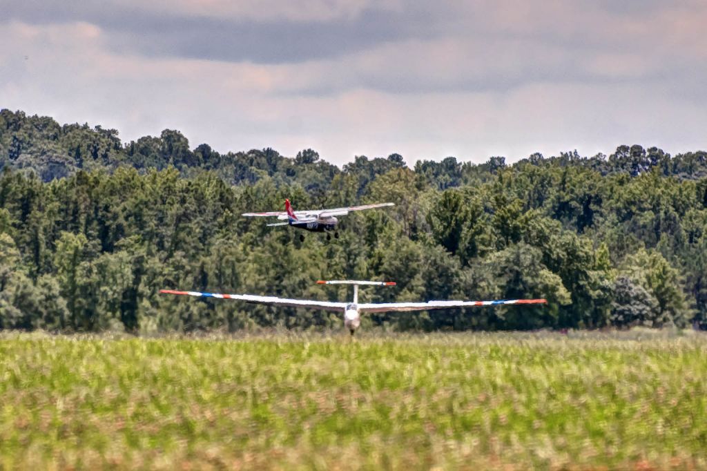 Cessna Skyhawk (N98731) - A CIvil Air Patrol aircraft passes a glider during glider operations at LaGrange Callaway Airport.