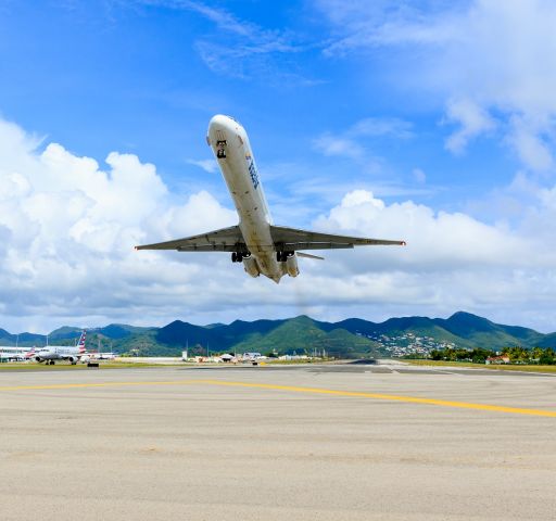 McDonnell Douglas MD-83 (P4-MDG) - Insel air P4-MDG departing TNCM