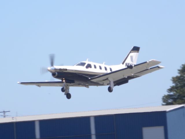 Socata TBM-700 (N56WF) - N56WF leaving BLM on Rwy 32