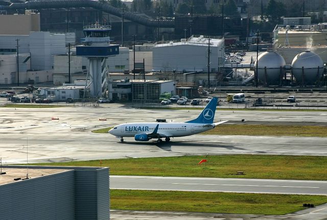 Boeing 737-700 (LX-LGS) - KBFI - A new 737-7 (33965/1634) on Jan 24th, 2005 arriving at Boeing Field after a pre-delivery test flight.