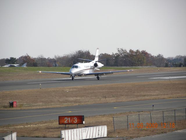 Cessna Citation Excel/XLS (N623QS) - N623QS landing on Runway 32 at KBLM