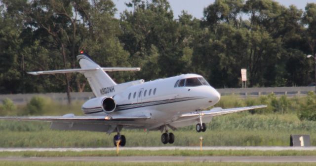 AMERICAN AIRCRAFT Falcon XP (N800WH) - Executive Jet landing on Runway 30 at Gary Regional Airport.