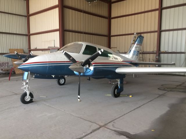 Cessna 310 (N21KB) - Pic from the Airways paint shop. Getting touch-up and detail. WOW they are doing a great job