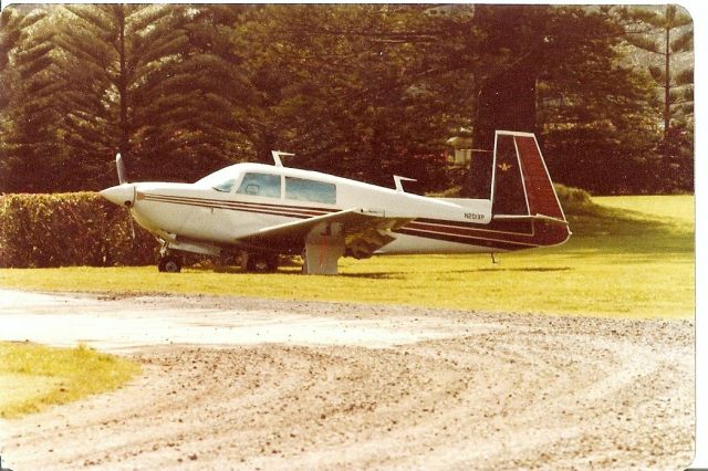 N201XP — - Photo taken Aug 1978 at Norfolk Island Airport (South Pacific) while aircraft was being refuelled .It was  being used as a comms plane for a ferry flight of new Cessnas from US to Australia. Cessnas were stripped out for extra fuel tanks and only had CBs to communicate with each other. Planes came via Hawaii, Pago pago then to Norfolk Island and on to Aust. The Mooney pilot told us that when flying close with the Cessnas he had to use flaps to avoid pulling away as the Cessnas were too slow for him!