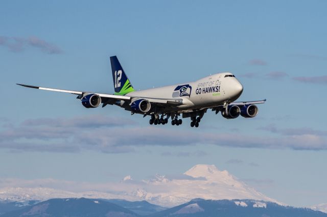 Boeing 747-200 (N770BA) - On return from a Seattle Seahawks Super Bowl victory parade fly-over of CenturyLink Field. Great sunny weather and an approach from the north end of KPAE makes for a nice shot.