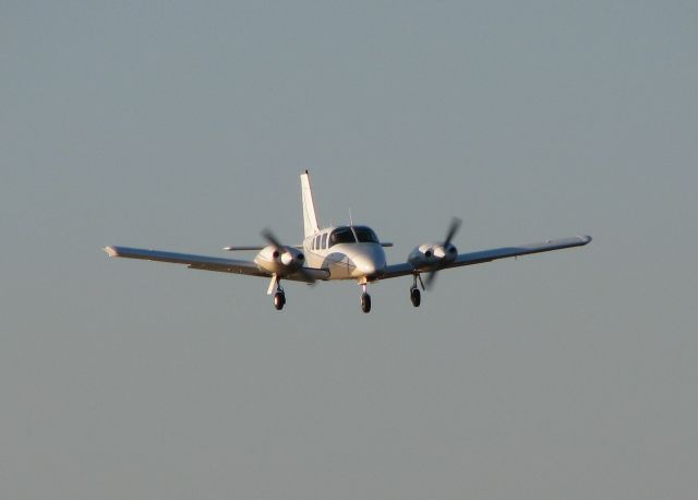 Piper Seneca (N21437) - Landing at the Downtown Shreveport airport.