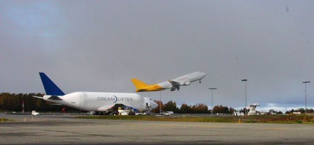 Boeing Dreamlifter (N780BA) - DHL/Kalitta 747 takes off near The Dreamlifter