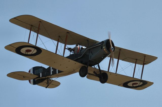 VH-IIZ — - Reproduction Brisfit running from Fokker DR1 at TAVAS air pagent Caboolture 23rd April 2016 - note the rear ginner working hard to try and take out the triplane. Flown by the legendary Jack Macdonald - a sprightly 87 years young