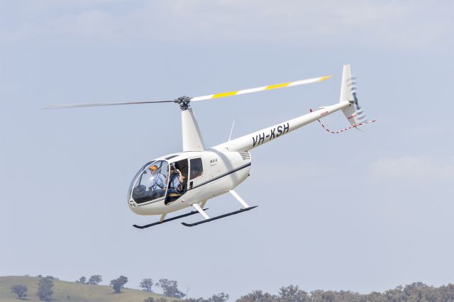 Robinson R-44 (VH-KSH) - Wagga Air Centre (VH-KSH) Robinson R44 Raven I departing for a joy flight during the Wagga City Aero Club open day at Wagga Wagga Airport