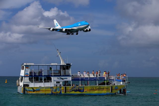 Boeing 747-400 (PH-BFL) - From famous Maho Beach.The boat is a good place for spotting location...