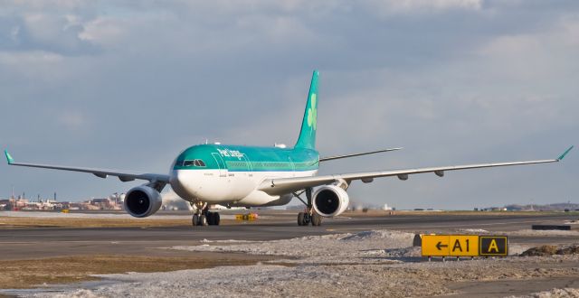 Airbus A330-200 (EI-DUO) - Colum/St.Columba arriving under an ominous winter sky @ KBOS Logan Airport