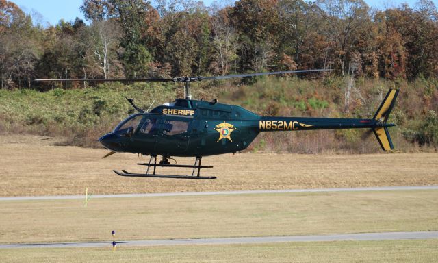 N852MC — - A Bell OH-58A of the Morgan County, AL, Sheriffs Department moving down the taxiway at Folsom Field, Cullman Regional Airport, AL - October 4, 2016.