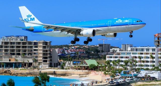 Airbus A330-200 (PH-AOF) - KLM PH-AOF over Maho beach area for landing at TNCM St Maarten.