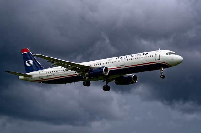 Airbus A321 (N562UW) - 7/21/2015. Short final on 19R