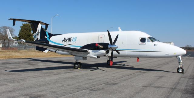 Beechcraft 1900 (N247GL) - A Beech 1900D Super Freighter on the ramp at Boswell Field, Talladega Municipal Airport, AL - mid-morning, February 11, 2022.