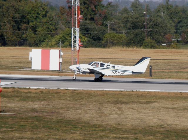 Beechcraft Baron (58) (N731JP) - This Baron landing at Blue Grass Airport (KLEX), just in from Pike County-Hatcher Field (KPBX)...