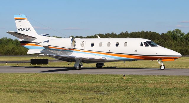 Cessna Citation Excel/XLS (N38AD) - A 2019 model Textron (Cessna) 560XL Citation XLS+ taxiing for departure at Boswell Field, Talladega Municipal Airport, AL, following the NASCAR GEICO 500 race at Talladega Super Speedway - late afternoon, April 25, 2021.