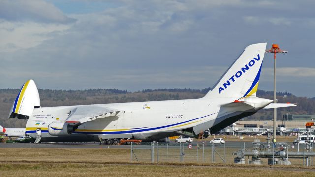 Antonov An-12 (UR-82007) - Nose up and aft ramp half way down.