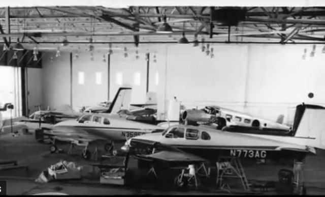 Beechcraft Twin Bonanza (N773AG) - N773AG in the Combs Hangar at the old Denver Stapleton airport around 1965