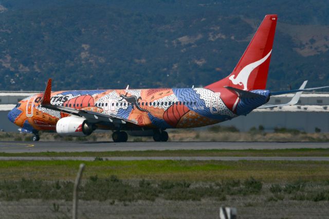 Boeing 737-800 (VH-VXB) - 'Yananyi Dreaming' rolling for take-off on runway 05. Monday, 14th April, 2014.