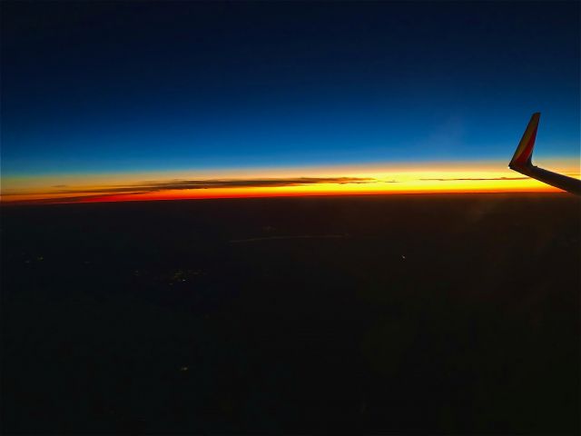 Boeing 737-700 — - Early morning sunrise out of KRSW.