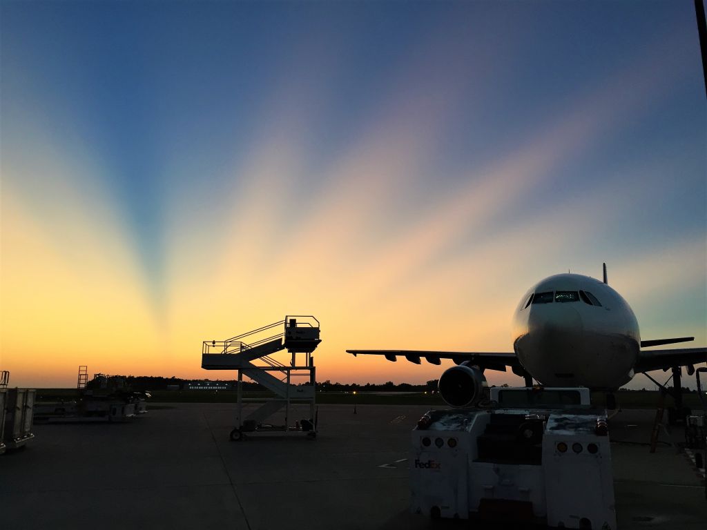 Airbus A300F4-600 (N750FD) - Spectacular Crepuscular Rays bathe Fed Ex Airbus "Saki" in a warm glow.  br /The rays were caused by sunlight below the horizon striking thunderstorm tops 250 miles away in Rochester, MN ...some light blocked / some light gets through.  br / br /Also a very humid air mass over WI on a Sept. 30 2019 evening.  