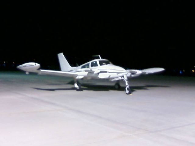 Cessna 310 (N4169Q) - Sitting at KAJR (Habersham County Airport) @ night.