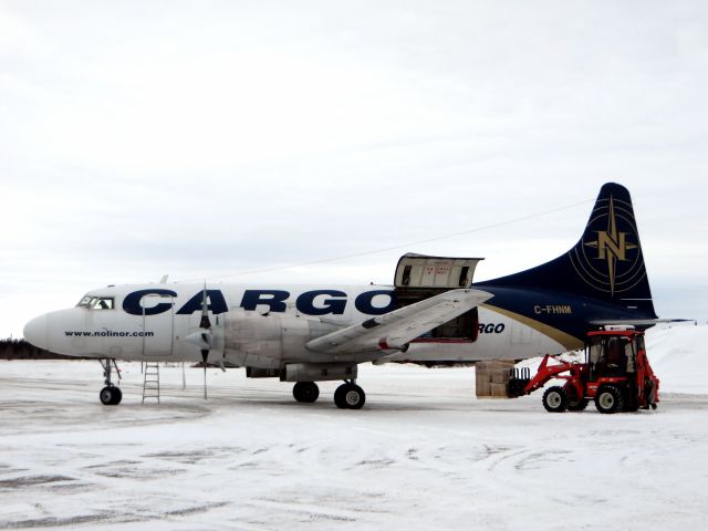 CONVAIR CV-580 (C-FHNM) - C-FHNM, A Nolinor Convair 580 delivering a load of food to Poste-Montagnais (CSF3), Québec - November 2014