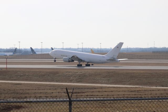 BOEING 767-200 (N768AX) - An unmarked DHL/ABX plane rotates off of 18L.